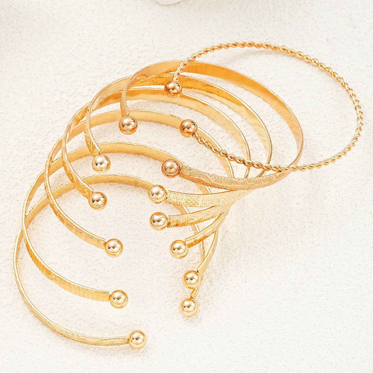 7-Piece Gold Heart Stackable Bracelet Set | Punk & Boho-Chic Cuff Collection