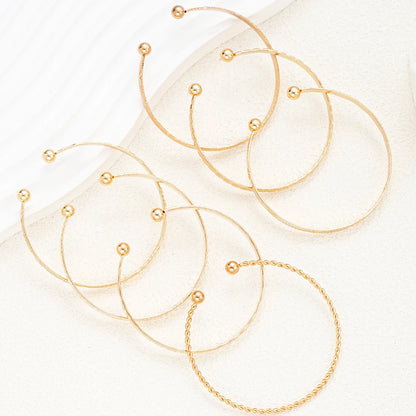 7-Piece Gold Heart Stackable Bracelet Set | Punk & Boho-Chic Cuff Collection