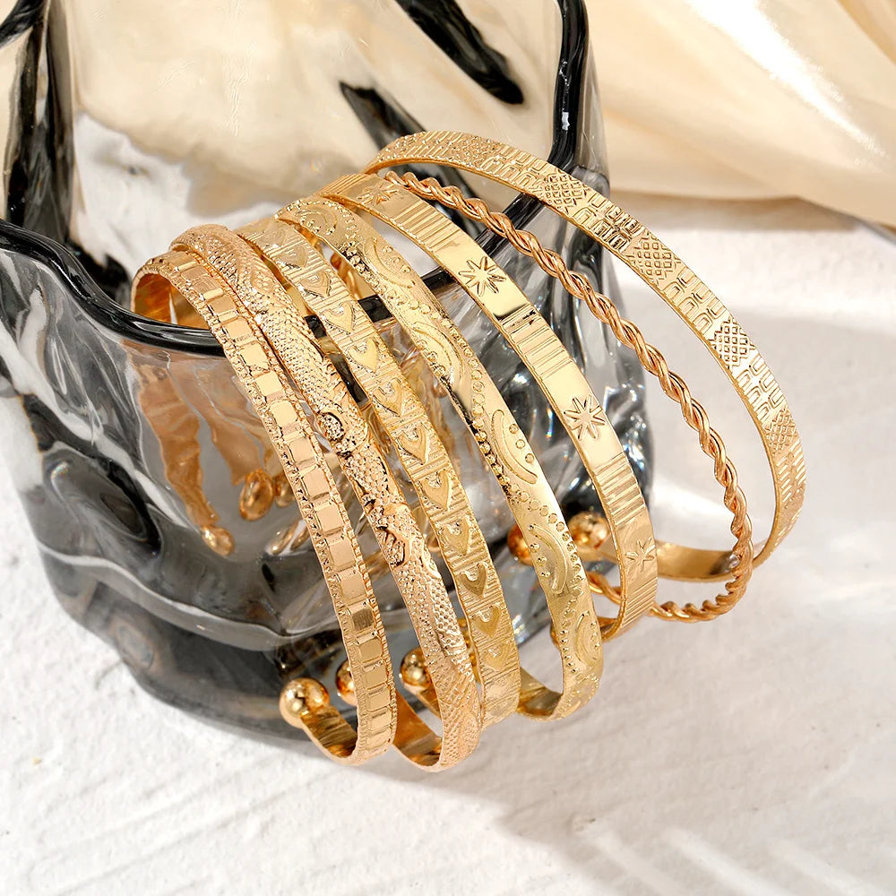 7-Piece Gold Heart Stackable Bracelet Set | Punk & Boho-Chic Cuff Collection