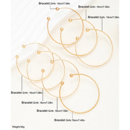 7-Piece Gold Heart Stackable Bracelet Set | Punk & Boho-Chic Cuff Collection