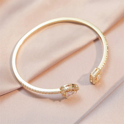 Geometric Gold Cuff Bangle | AAA+ Cubic Zirconia Tension Setting, Copper, 7g