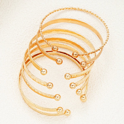 7-Piece Gold Heart Stackable Bracelet Set | Punk & Boho-Chic Cuff Collection